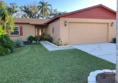 residential exterior painting project peach and plum house